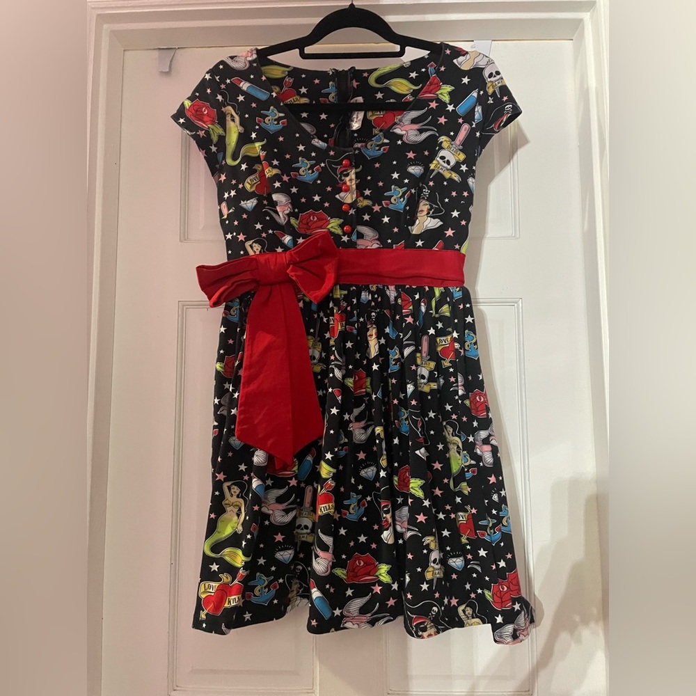 Deadly Dames tattoo print babydoll dress size large. Used condition